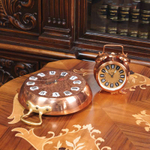 Настенные винтажные часы и настольный будильник