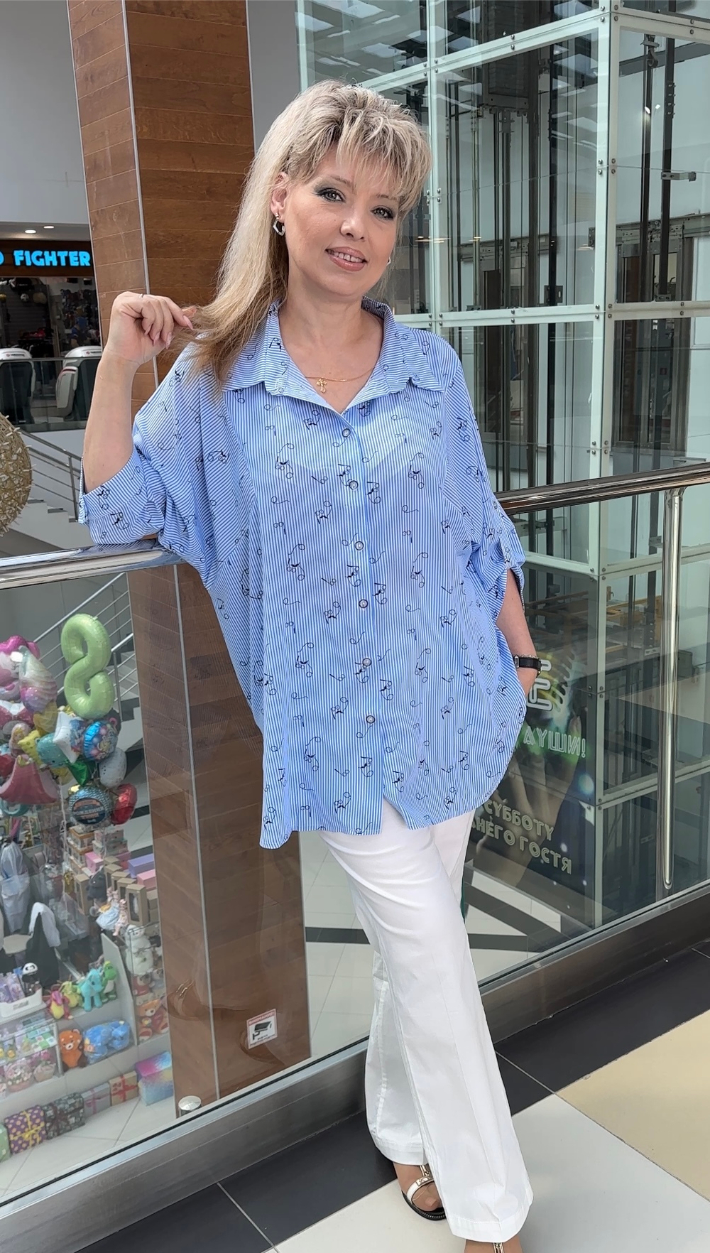 Голубая в мелкую полоску блузон-рубашка на пуговицах