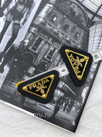 Логотип металлический Прад. на коже черный золото