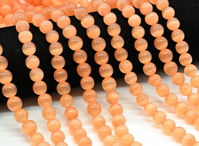 кг10-п Кошачий глаз (имит.) 10мм, персик, нить 19см