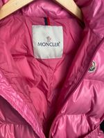 Пуховой комбинезон Moncler