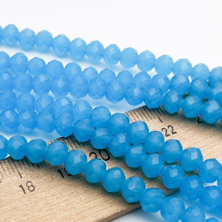Бусины рондель с огранкой, стекло, цвет голубой полупрозрачный, размер около 4,8*6 мм, цена за 38-39 шт (1/2 нити)
