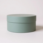 Плотная короткая круглая коробка(без ручек).Цвет: Нежно зеленый.