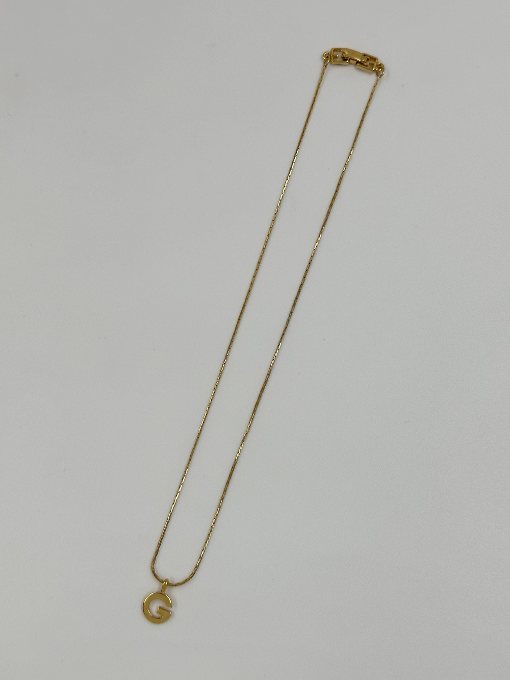 Кулон-лого Givenchy