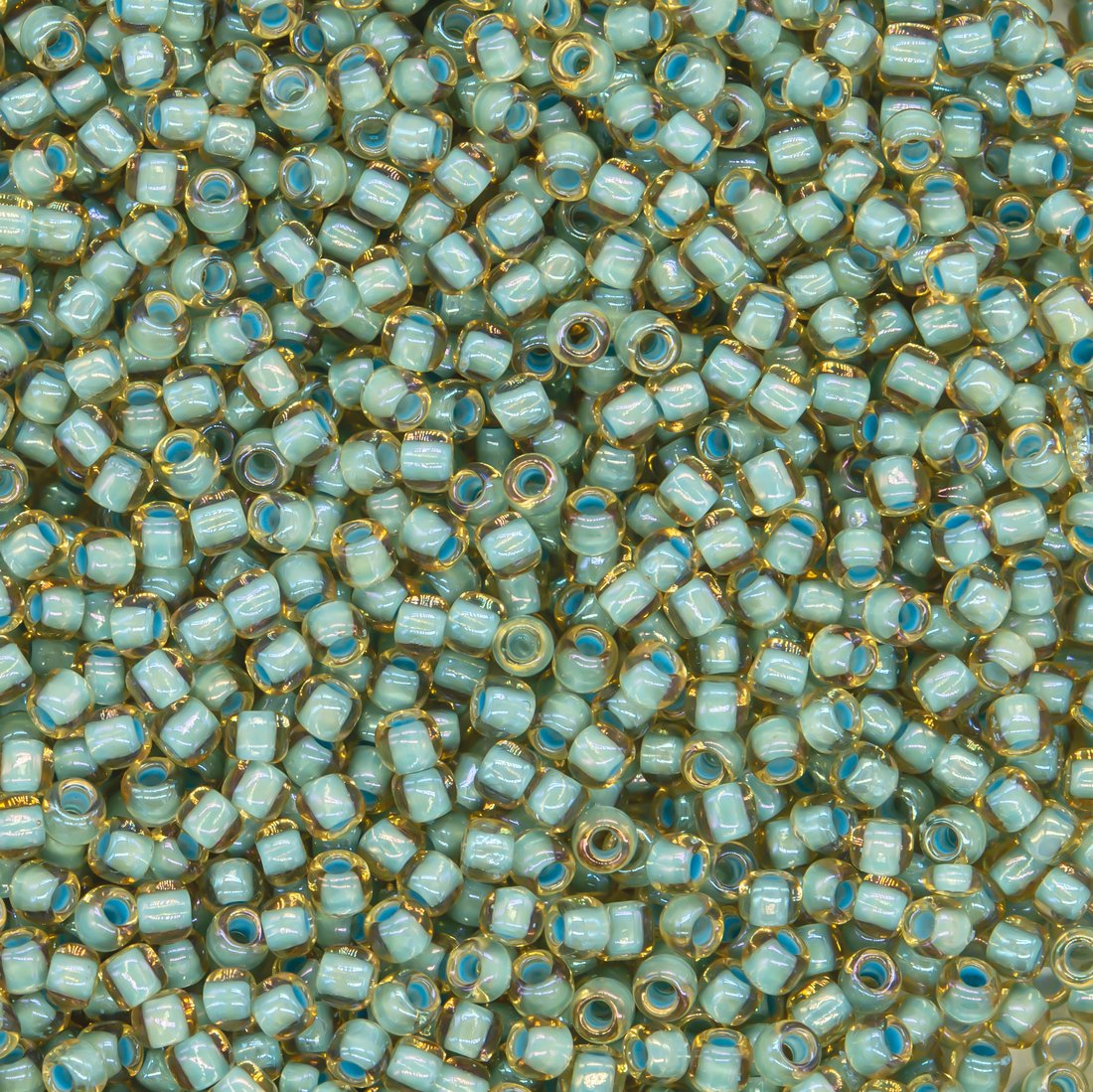 Японский бисер TOHO Round 11/0 (№952), окрашенный изнутри прозрачный