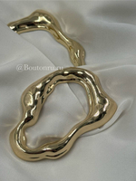 Декоративный пришивной элемент золотистый неровной формы