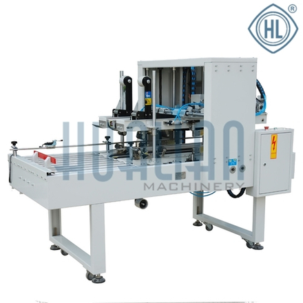 Автоматический заклейщик коробов по граням.