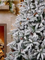 Заснеженная елка с шишками «ile Grande» (Литая+пвх) от 1,8 м до 2,7 м