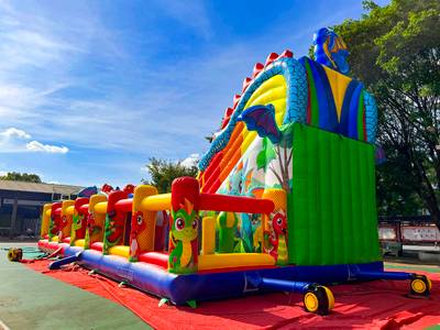 Коммерческий надувной батут «Драконы в тропиках» с механизированной головой, 14*7*7,3 м