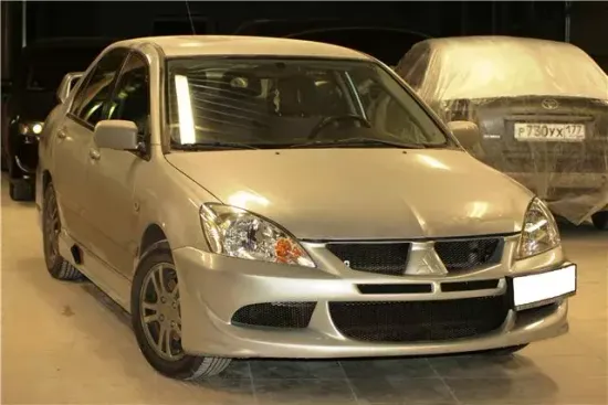 Передний бампер в стиле EVO STYLE для Mitsubishi Lancer 9