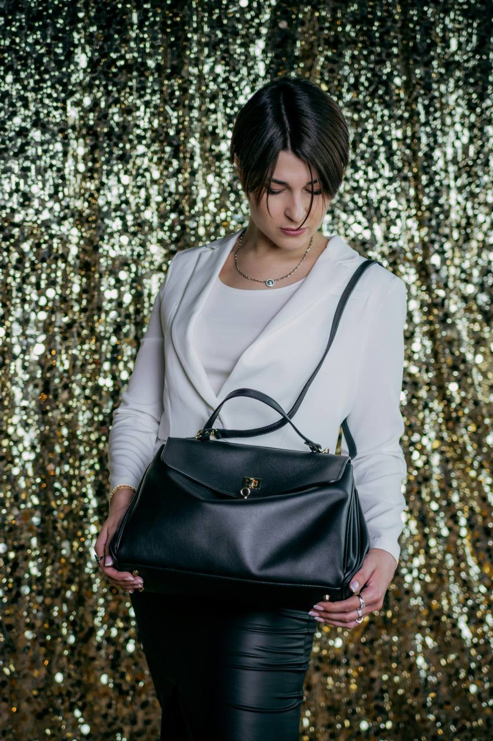 Женская сумка из натуральной кожи ягненка черного цвета