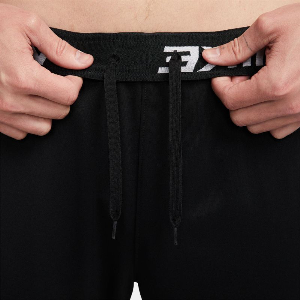Теннисные брюки Nike Totality Dri-FIT Tapered Versatile Trousers - black/white - Black