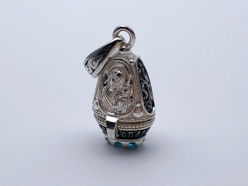 Ладанка из серебра/Чернение/С подвижным ухом/Со вставкой из красного фианита/Семистрельная