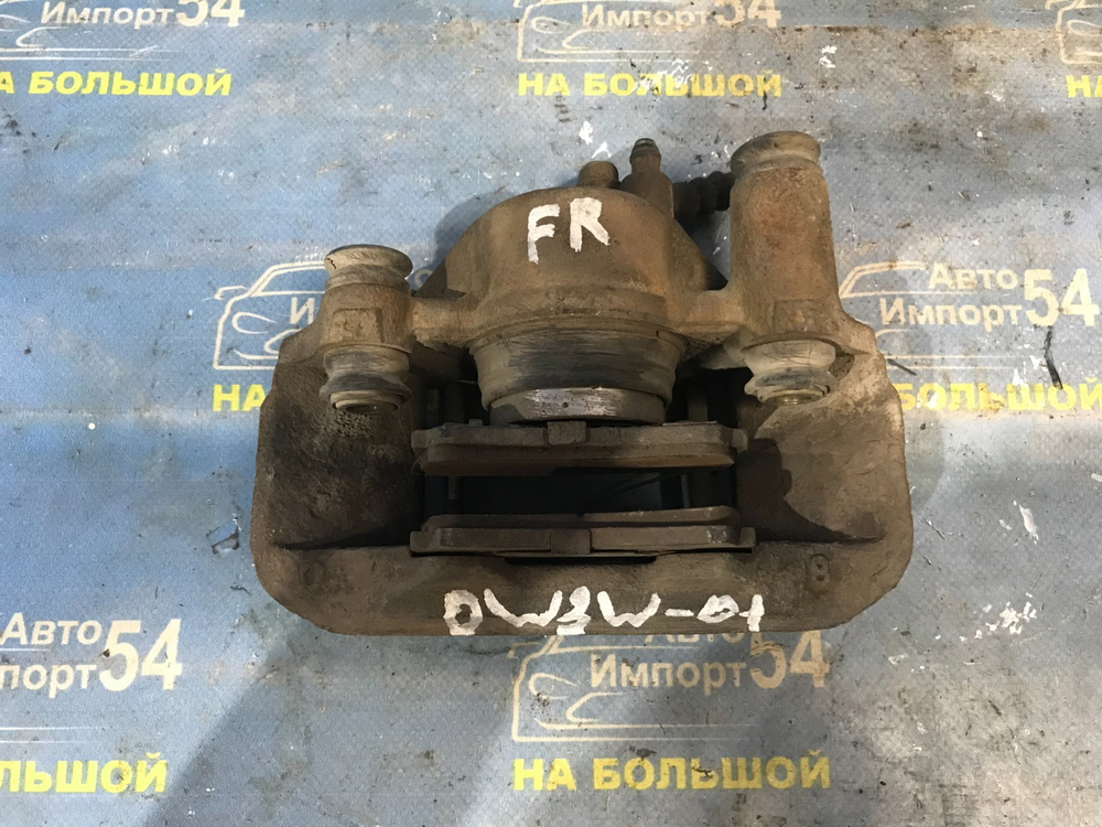 Суппорт тормозной передний правый MAZDA DEMIO 2001