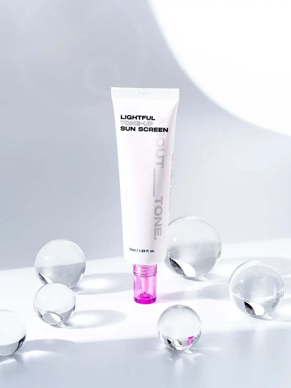 About Tone Легкий освежающий солнцезащитный крем SPF50 Lightful Tone-Up Sun Screen 50 мл