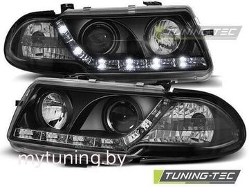 Передние фары Opel Astra F daylight black
