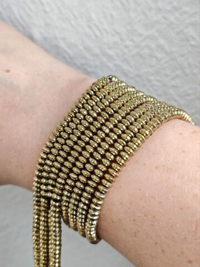 гш42-аз Гематит синт. шайба гладкая 4*2мм, античное золото, нить 19см