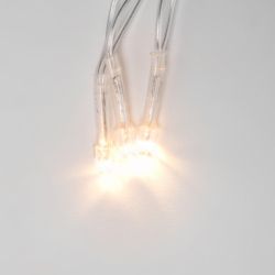 ULD-S1000-100-DTA WARM WHITE IP20 Гирлянда светодиодная. 10м. 100 светодиодов. Теплый белый свет. Провод прозрачный. ТМ Uniel