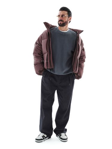 Короткий стеганый пуховик в цвете шоколад