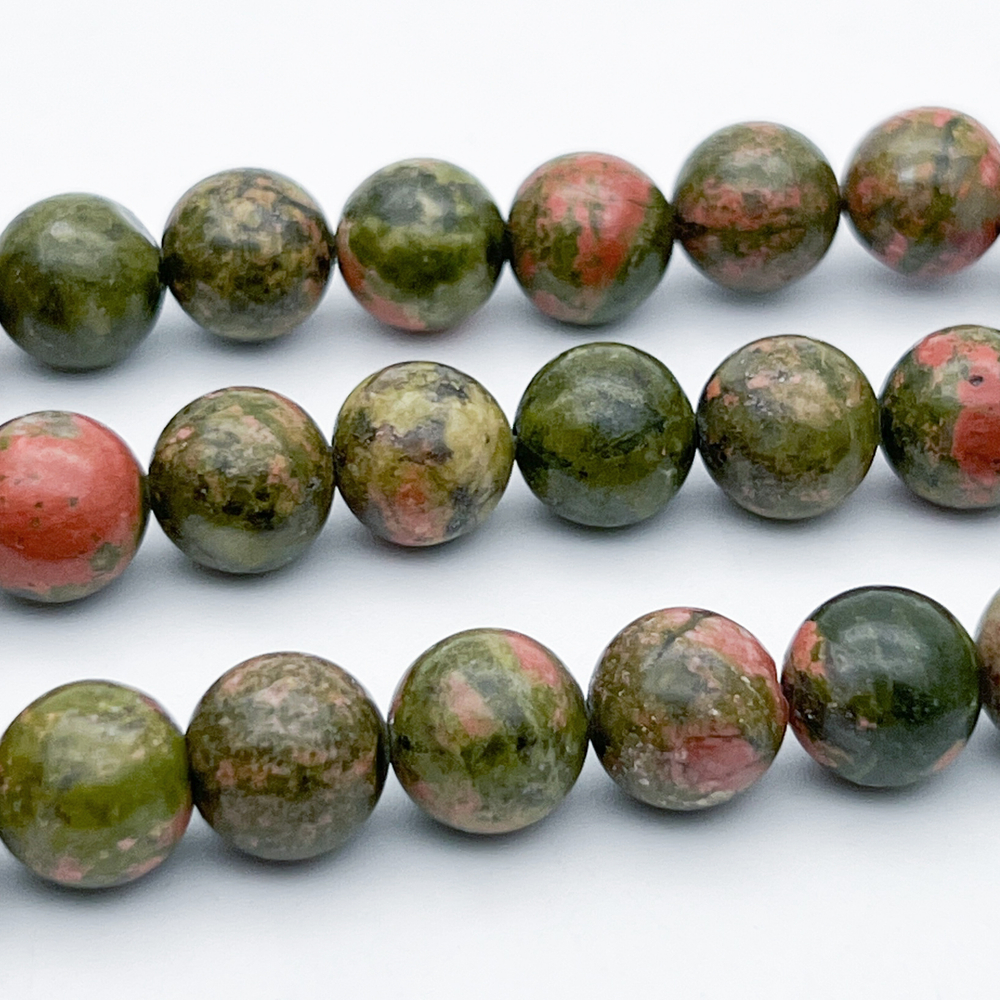 Унакит бусины, диаметр 10,2-10,4 мм, цена за 18-19 шт (1/2 нити)