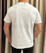 Белая футболка Loewe с декоративной эмблемой на груди