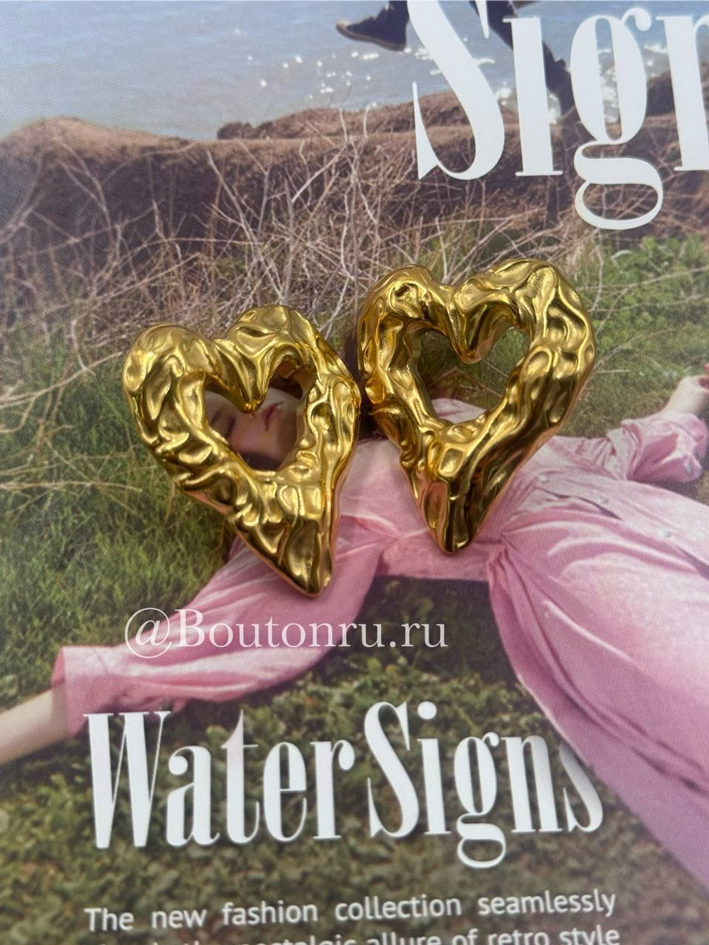 Серьги объемные золотистые в форме сердца