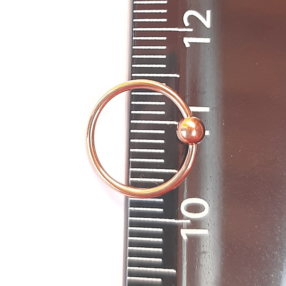 Кольцо сегментное диаметр 10 мм, шарик 3 мм, толщина 1,2 мм для пирсинга. Медицинская сталь, розовая позолота. 1 шт