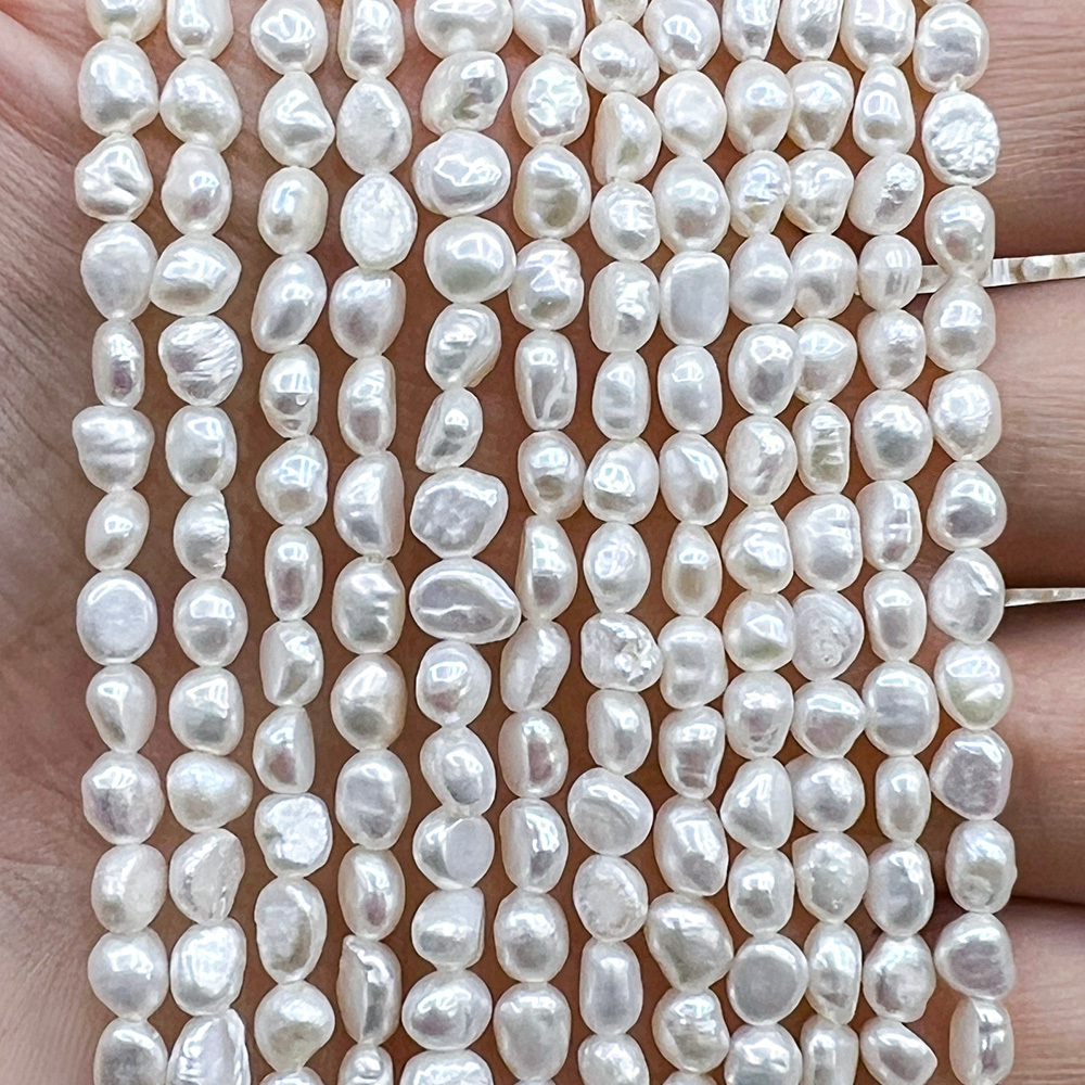 Жемчуг 2А речной бусины 3-4 мм, на нитке 38 см