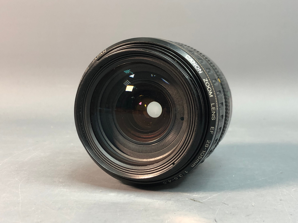 Canon EF 28-105mm 3.5-4.5 USM скол на задней линзе