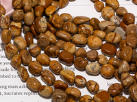 Нить бусин из песочной яшмы 7х9мм, галтовка