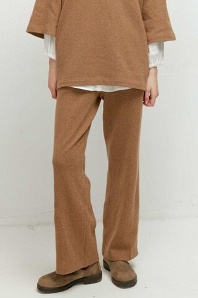 Брюки из трикотажа песочного цвета