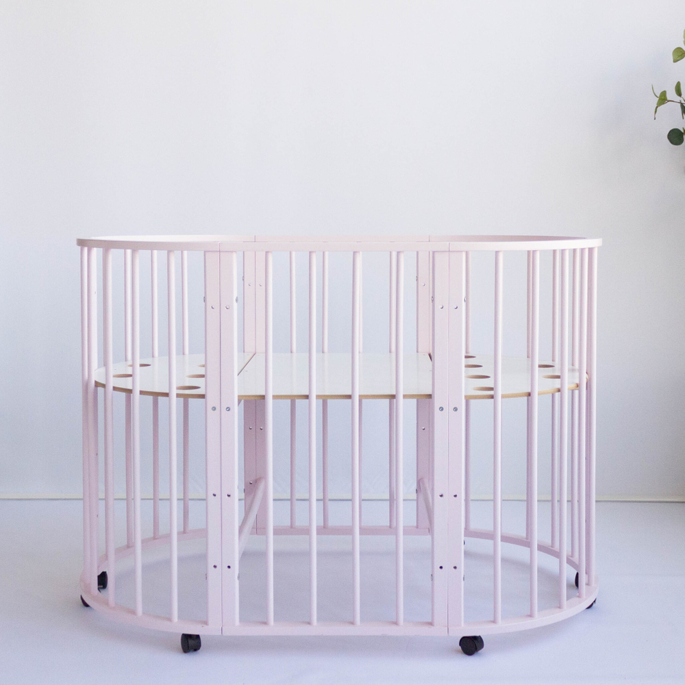 Кроватка-трансформер МАЛЮТКА 7 в 1 с маятником (Розовый)