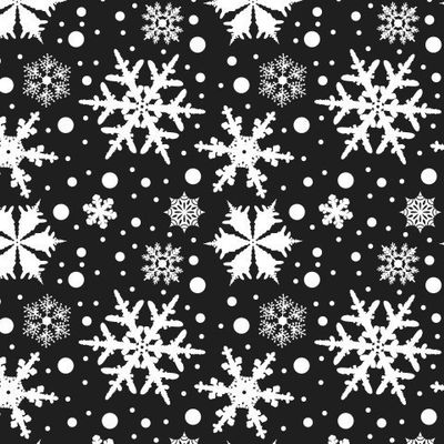 белые снежинки разных форм на черном фоне