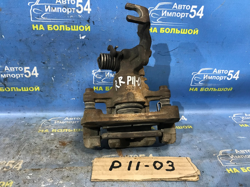 Суппорт тормозной задний правый NISSAN PRIMERA 1999