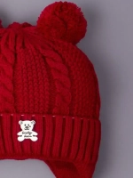 Шапка вязаная демисезонная на завязках