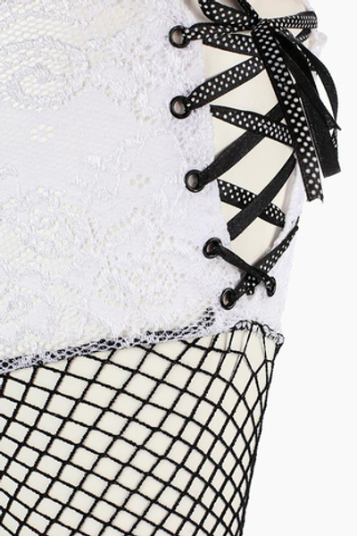 Чулки Le Frivole с широкой белой резинкой на завязках черные S/M