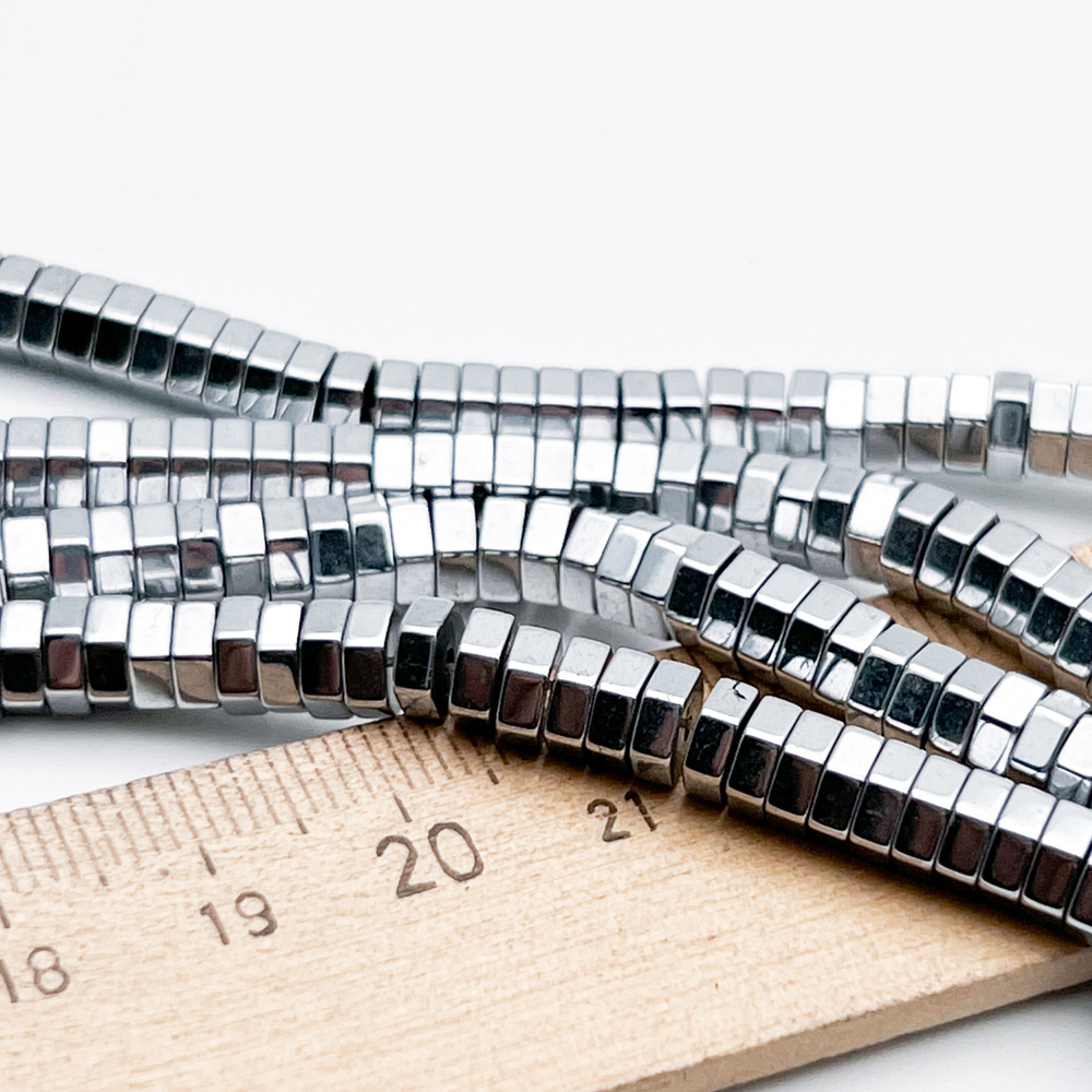 Гематит Рондель 6 граней бусины (имитация), цвет серебристый, размер около 2*5,5 мм, цена за отрезок 19 см (1/2 нити)