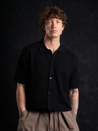Черная трикотажная рубашка Laine с коротким рукавом