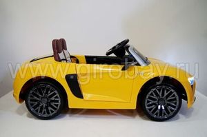 Детский электромобиль River Toys AUDI R8 желтый