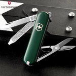Нож перочинный Victorinox Classic (0.6223.4) 58мм 7функций зеленый