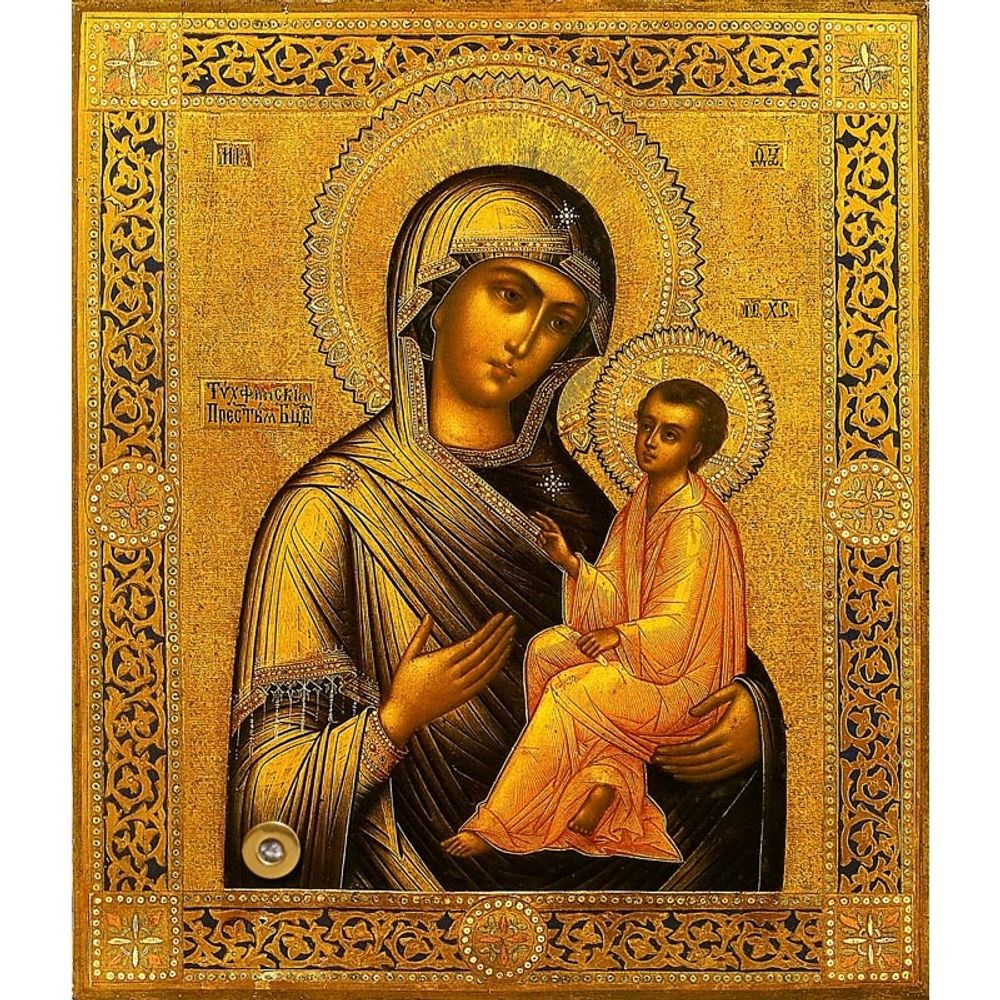 Тихвинская икона Божьей Матери на доске с мощевиком.