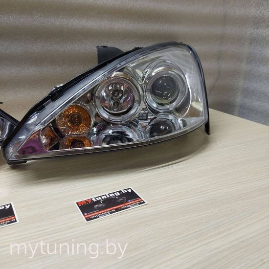 Передние фары Ford Focus 1 angel eyes chrome