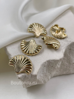 Пуговицы Скиапар. золотистые в форме ракушки