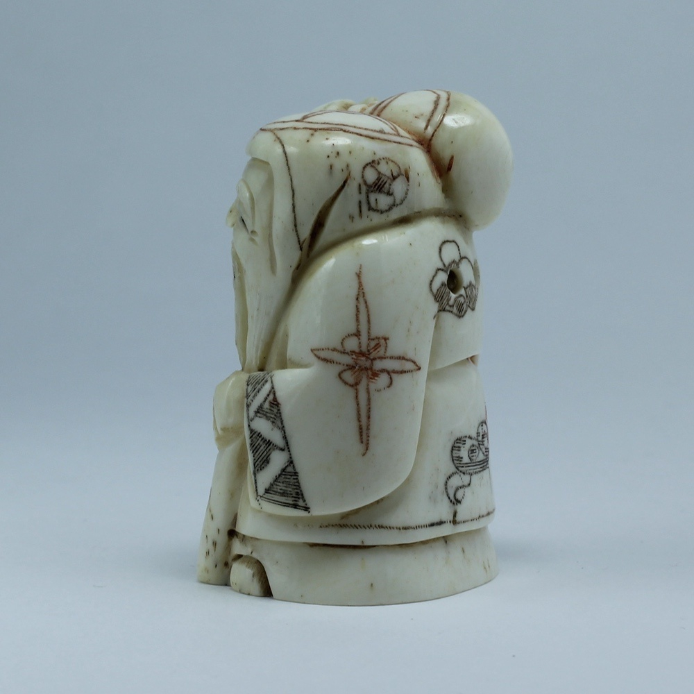 Нэцкэ Фукурокудзю с посохом и мешком риса