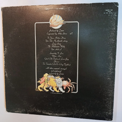 Queen A Day At The Races VG cover (UK 1976)