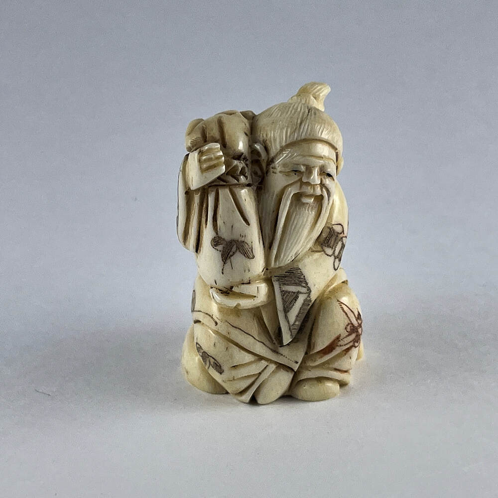 Статуэтка нэцкэ Монах с мешком риса
