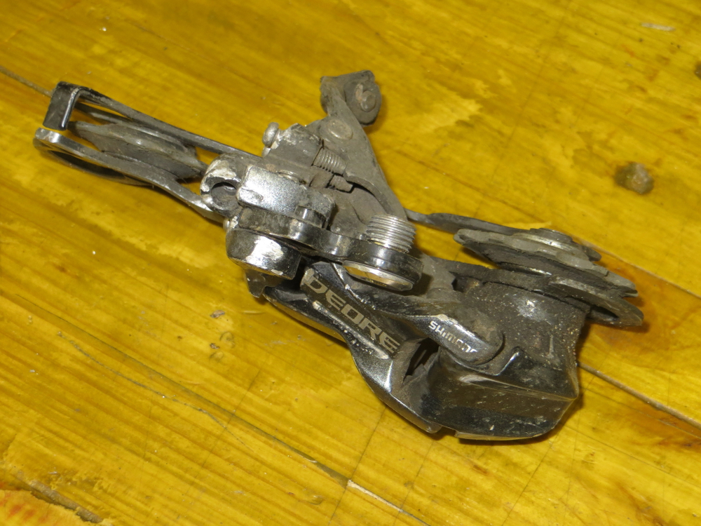 Переключатель задний Shimano Deore Shadow 9 скоростей