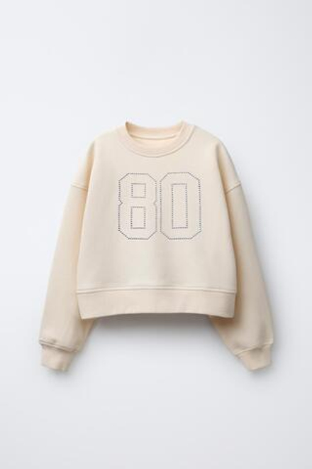 ZARA ТОЛСТОВКА С ЗАКЛЕПКАМИ В ВИДЕ ЦИФРЫ, ЭКРЮ