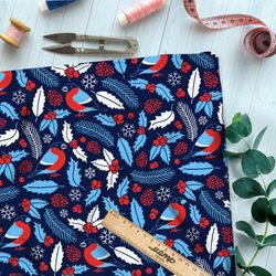 Ткань блэкаут голубые снегири и листья с шишками на синем фоне