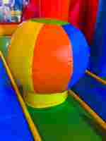Коммерческий надувной батут «Радужный» с крышей, 5,9*5*3,5 м